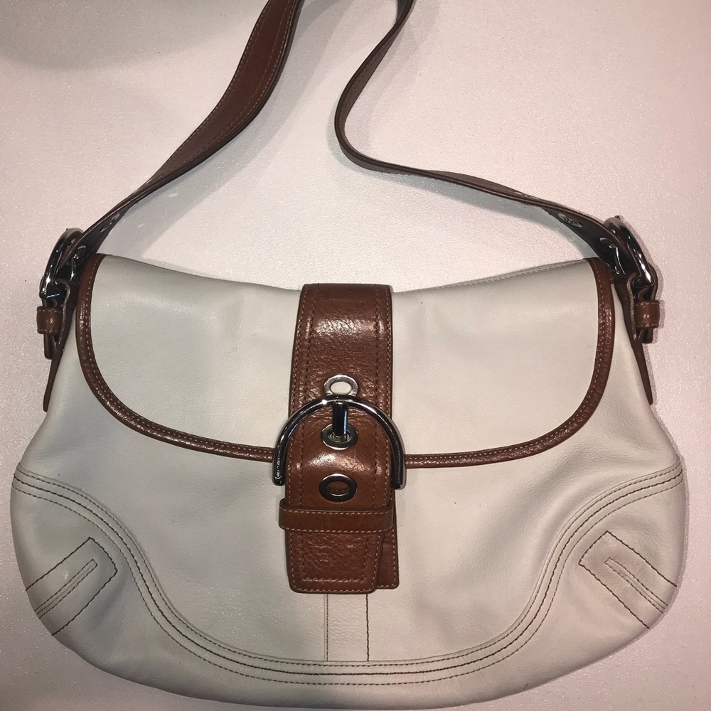Gently used white and beige coach bag